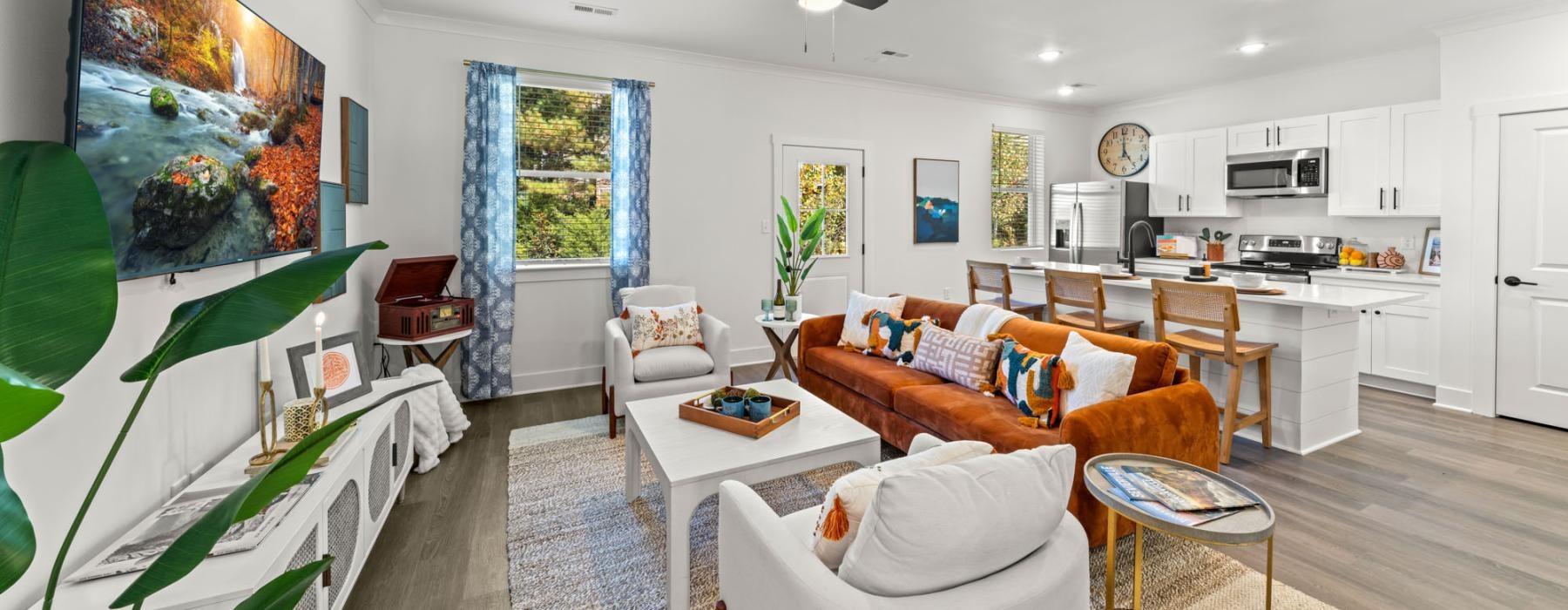 a living room with a large painting