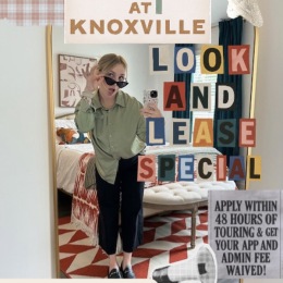 a girl posing in a mirror