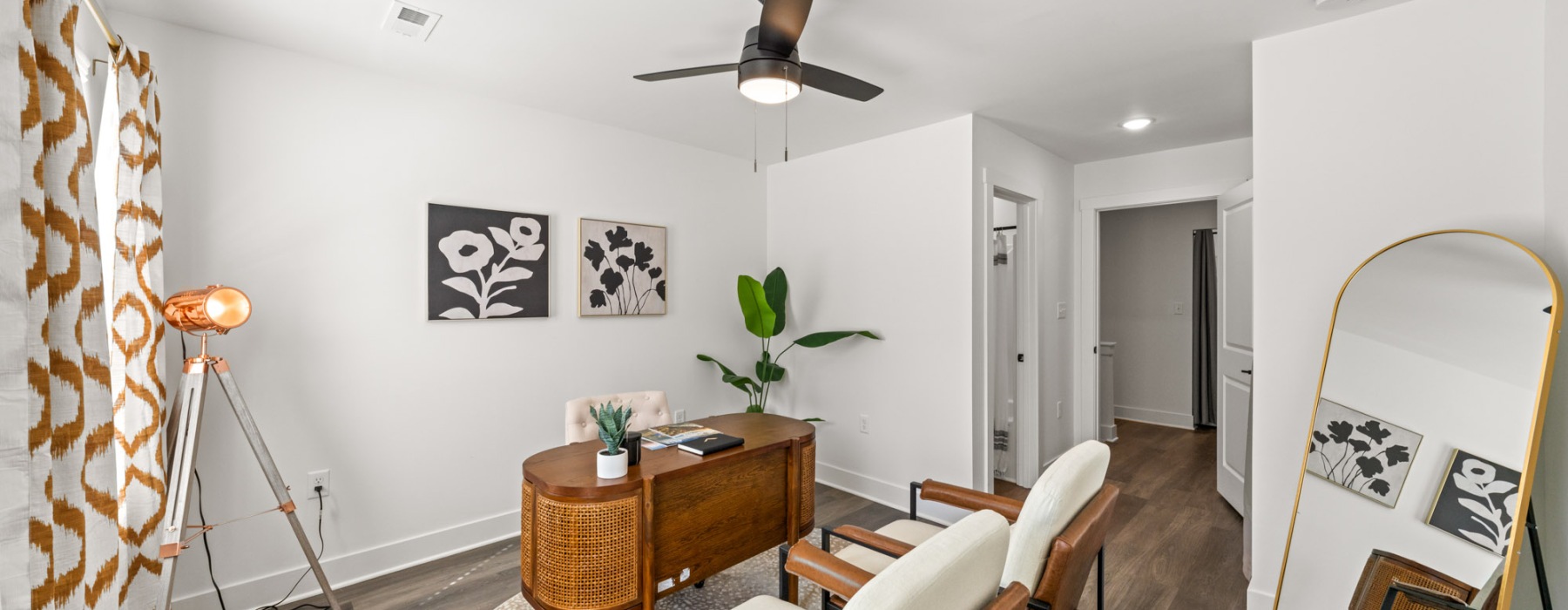 a room with a table and chairs