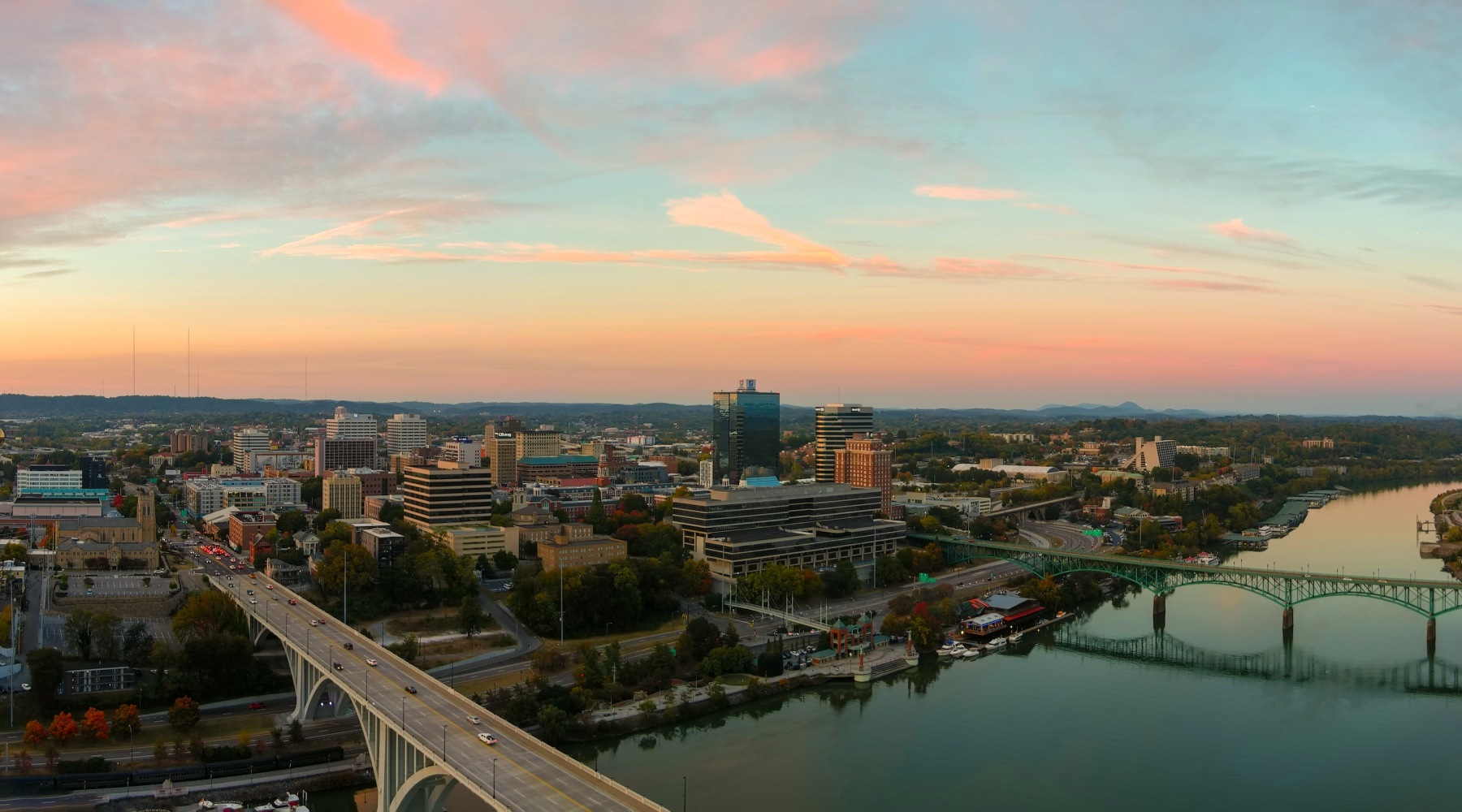 a sunset over a community
