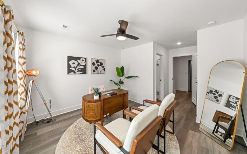 a room with a table and chairs