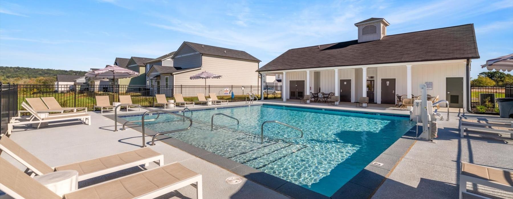 pool area with reclining seating